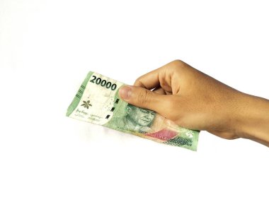 Beyaz bir zemin üzerinde izole edilmiş bir Endonezya rupiası, Endonezya para biriminin adıdır..