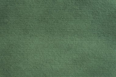 Çevre projeleri için geri dönüştürülmüş koyu yeşil kıvrımlı karton el işi arka plan. Kabataslak bir kutu boş alan, geri dönüşümlü kağıt, hatıra defteri, kart, afiş. Sürdürülebilir paketleme.