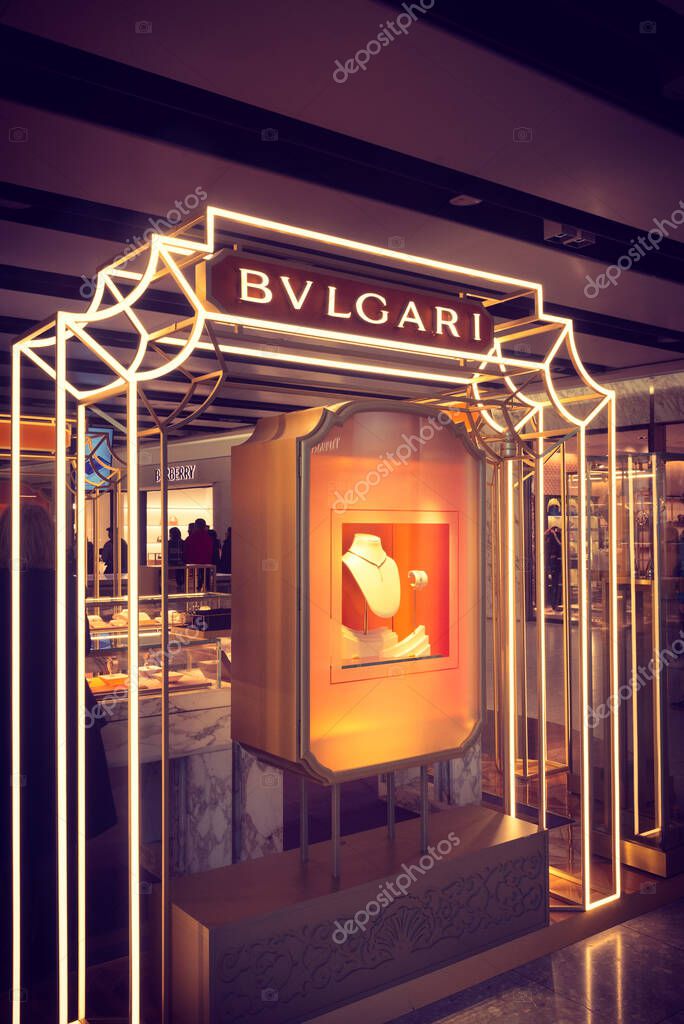 London, UK, 03.23.2024 - Bvlgari shop store window boutique in airport. Luxury business. Bvlgari is famous for its high-quality jewelry and accessories. The Italian brand now belongs to LVMH group.
