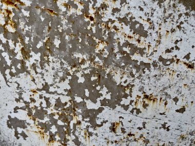 Beyaz boya ve pas lekelerini gösteren yıpranmış metal dokusu. Tasarım, sanayi temalı arka planlar, oyunlar, film tasarımı veya konsept sanatı için ideal