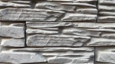 Ayrıntılı duvarlı taştan duvarın yakın çekim görüntüleri. İnşaat, geçmiş ve ev tasarımlarında hisse senedi kullanımı için harika..