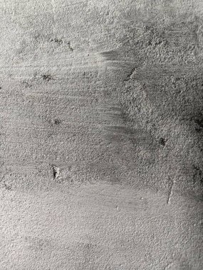 Grunge arkaplan dokusu, Kirli Sıçrama Duvarı, Soyut Sıçrama Sanatı. Arka plan için beton duvar beyaz gri rengi. Çizikler ve çatlaklarla eski grunge dokuları. Beyaz boyanmış beton duvarlar. Binanın duvarından soyut boya dökülüyor.