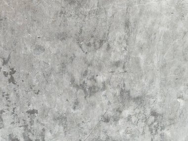 Duvar pürüzlü, tırnak izleri ve çatlakları olan doku. Stucco beyaz duvar arka plan vintage rengi ve yumuşak harmanlanmış fırça darbeleriyle gerilmiş doku. Grunge dokusu. Tek renkli grunge doku çizimi.