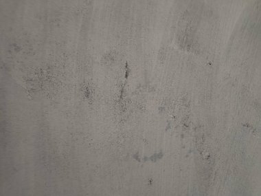 Grunge arkaplan dokusu, Kirli Sıçrama Duvarı, Soyut Sıçrama Sanatı. Arka plan için beton duvar beyaz gri rengi. Çizik ve çatlaklarla eski grunge dokuları. Beyaz boyanmış beton duvar. Bina duvarındaki boya soyuluyor..