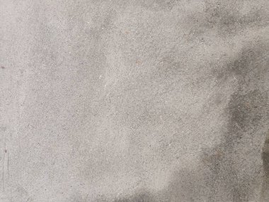 Çizik ve çatırtı olan duvar parçası. Renkli duvar kâğıdının deseni soyulan eski, kirli, deri döken arka plan sıvısı. Arka plan için yüzey duvarı betonu deseni. Gri arka plan eski rengi ve yumuşak arka plan deseni süngerlenmiş..