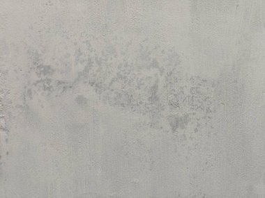 Çizik ve çatırtı olan duvar parçası. Renkli duvar kâğıdının deseni soyulan eski, kirli, deri döken arka plan sıvısı. Arka plan için yüzey duvarı betonu deseni. Gri arka plan eski rengi ve yumuşak arka plan deseni süngerlenmiş..