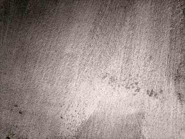 Çizik ve çatırtı olan duvar parçası. Renkli duvar kâğıdının deseni soyulan eski, kirli, deri döken arka plan sıvısı. Arka plan için yüzey duvarı betonu deseni. Gri arka plan eski rengi ve yumuşak arka plan deseni süngerlenmiş..