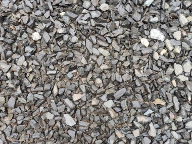 Eski beton duvarın dokusu. Açık gri çimento desenli beton duvar. Gri pastel, sert, çatlak, çimento, beton, kaya, alçılı sıva duvar..