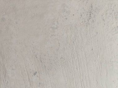 Çizikler ve çatlaklarla dolu bir duvar parçası. Eski, kirli, deri döküntüsü, desenli duvar kâğıdı kaplaması. Arka plan için yüzey duvarı betonu deseni. Grunge Arka plan dokusu, Kirli Su Sıçrayan Duvar, Soyut Sıçrayan Su.