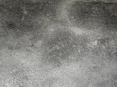 Eski beton duvarın dokusu. Açık gri çimento desenli beton duvar. Gri pastel, sert, çatlak, çimento, beton, kaya, alçılı sıva duvar..