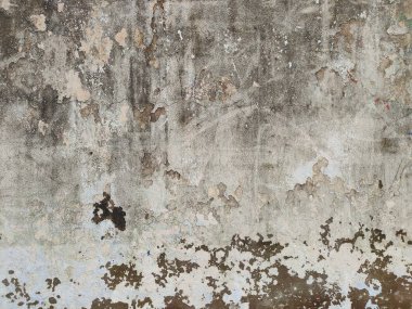 Çizik ve çatlaklarla duvarın alçı parçasını soyuyordum. Graffiti Sokak Sanatıyla Sorunlu Sarı Kahverengi Duvar. Arka plan ve Çizgiler Boyalı Çizgiler ve Çizgiler.