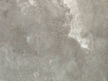 Çizikler ve çatlaklarla dolu bir duvar parçası. Eski, kirli, deri döküntüsü, desenli duvar kâğıdı kaplaması. Arka plan için yüzey duvarı betonu deseni. Grunge Arka plan dokusu, Kirli Su Sıçrayan Duvar, Soyut Sıçrayan Su.