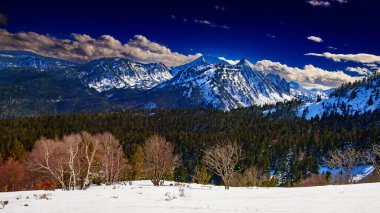 Snowy Mountain Landscape in the Pyrenees in France clipart