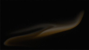 Siyah zemin üzerinde altın rengi olan saten gibi soyut tasarım