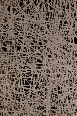 Beyaz desenli duvar. Beyaz örümcek ağı. Beyaz biberli çizgiler