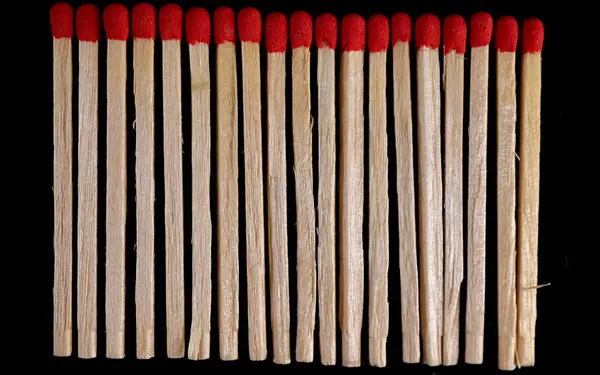 stock image The matches are lined up in a row. Matches. Close-up. Background. Wallpaper. Texture of matches.