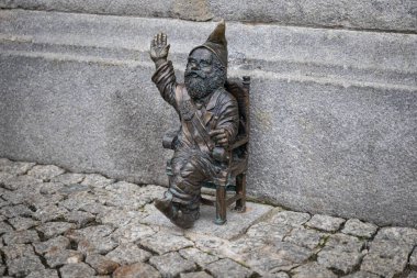 Wroclaw, Poland - January 25, 2025: Bronze Rooster from the Slaughtered Animals Monument in Wroclaw (Pomnik Zwierzt Rzenych we Wrocawiu)  clipart