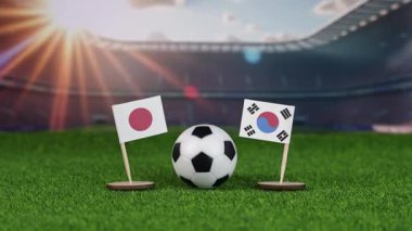 Japonya, Güney Kore futbol maçında bayraklar, yeşil sahada futbol topu ve bulanık stadyum, Asya spor rekabetini ve takım çalışmasını sembolize ediyor. yakınlaştır