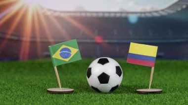 İspanya ve Kolombiya milli bayraklarla futbol maçı, yeşil sahada futbol topu ve stadyum arka planı uluslararası spor rekabetini ve takım çalışmasını sembolize ediyor.