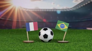 Fransa Brezilya 'ya karşı milli bayraklar, yeşil sahada futbol topu ve uluslararası spor müsabakası ve tutkusunu temsil eden bulanık stadyum. yakınlaştır