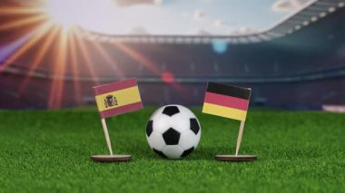 İspanya, Almanya 'ya karşı milli bayraklar, yeşil sahada futbol topu ve Avrupa' nın spor rekabetini ve birliğini simgeleyen bulanık stadyumla futbol maçı konsepti. yakınlaştır