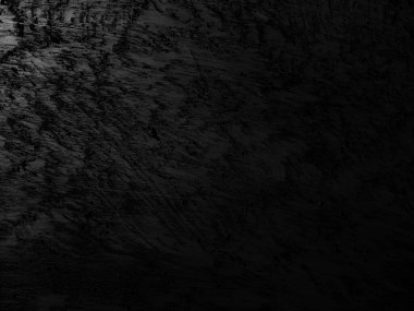 Doğal desenleri olan siyah mermer bir arka plan. Yüksek çözünürlüklü beyaz taş ve taş sanatıyla soyut arkaplan