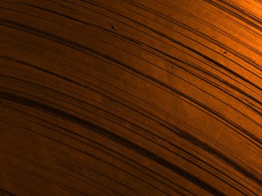 Doku içeren soyut turuncu arkaplan.