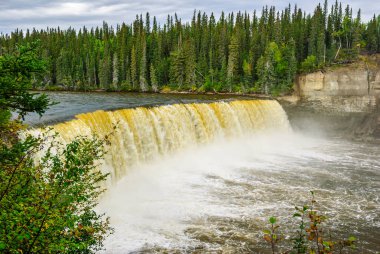 Lady Evelyn Falls, on the Kakisa River, one of the scenic stops on the Waterfalls Route in Canada's Northwest Territories. clipart