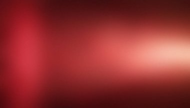 Sıcak, soyut bir arkaplan, hafif bir bokeh efektiyle koyu kırmızıdan yumuşak altın ışığa doğru eğimli..