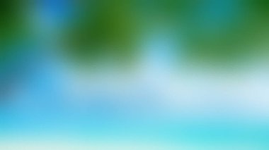 Yumuşak, odak dışı soyut bir görüntü canlı mavi ve yeşil renklerin karışımı, sakin ve rahatlatıcı bir görsel yaratıyor..