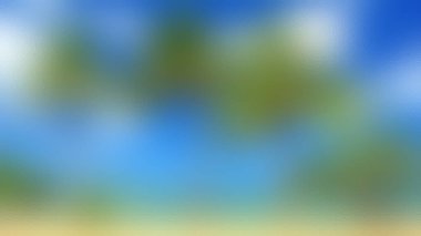 Yumuşak bir odak noktası, canlı maviler ve yeşilliklerle soyut bir görüntü, parlak, doğal bir açık hava manzarası öneriyor..