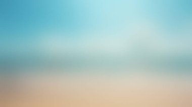 Sakin, odaktan uzak bir görüntü kumlu sahilden yumuşak mavi gökyüzüne yumuşak bir geçiş tasvir ediyor..