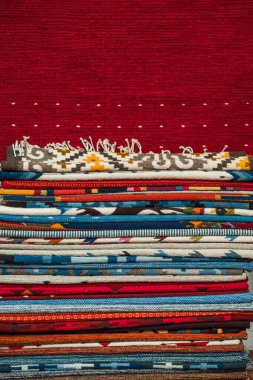 A closeup of the intricate process of making artisanal rugs or tapetes in Teotitlan Oaxaca clipart