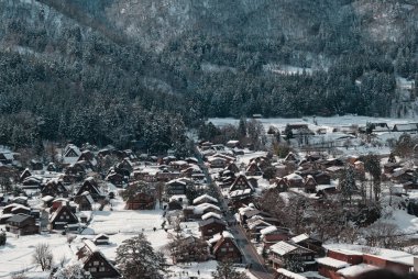 Snow-Covered Gassho-Style Houses in Winter at Gokayama and Shirakawa-go clipart