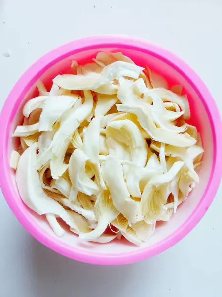 stock image Oyster mushroom pieces in a bowl isolate on white