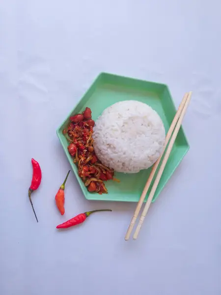 stock image rice side dish balado anchovies and peanuts isolate on white