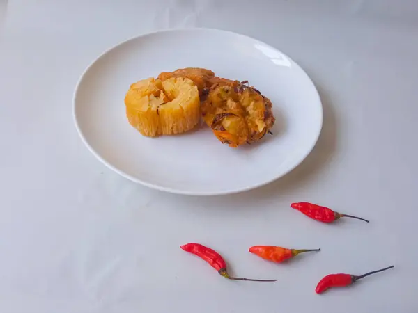 Stock image Gorengan : Fried food is one of the most popular types of snacks in Indonesia. Indonesian street food.Black background.