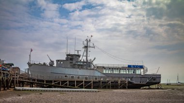 Retired former Royal Navy Minesweeper HMS Wilton repurposed as the headquarters of the Essex Yacht Club (EYC) at Leigh-on-Sea, Essex, UK clipart