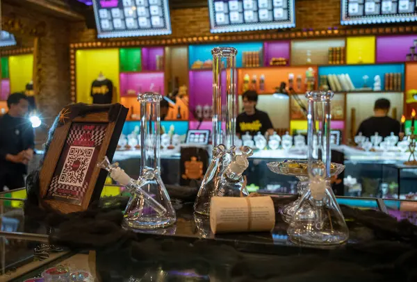 stock image Glass bongs (water pipes) for sale in a legal marijuana shop called wonderland on Sukhumvit Road in Bangkok, Thailand