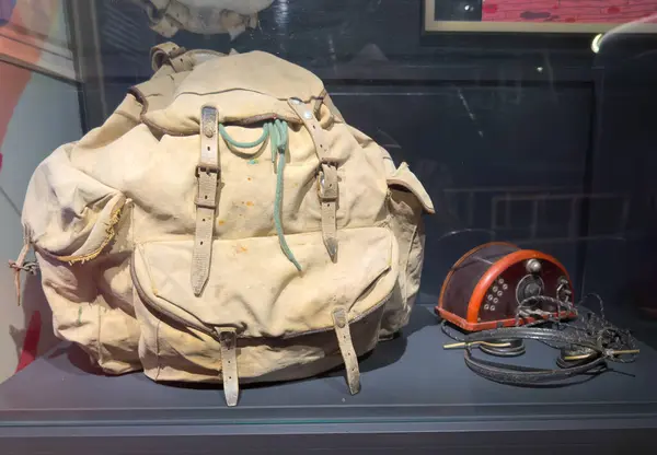 Stock image A canvas rucksack and radio equipment used by the French Resistance in WW2 on display at the  Resistance and Deportation Museum, Grenoble, France.