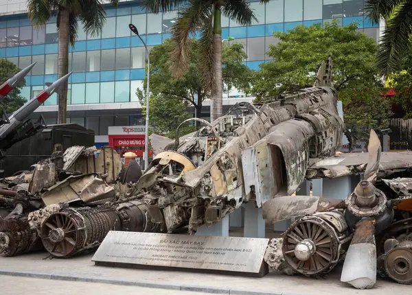 stock image The Vietnam War-era wreckage of a shot down USAF F-4 Phantom II fighter bomber together with the remains of B-52s on display at the Air Force Museum in Hanoi, Vietnam.