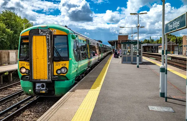 stock image A Southern Railway train pulls into Three Bridges Railway Station in West Sussex, UK.