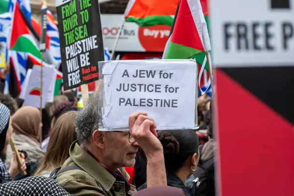 stock image London, UK. 18 May 2024: A Jewish man calls for justice for Palestine at the Nakba 76 March for Palestine against Israeli attacks on Gaza in central London, UK.