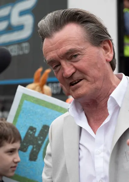 stock image London UK - Jun 22 2024: Envirnomental campaigner, former pop star and punk rocker Fergal Sharkey at the Restore Nature Now march for environmental protections. Organisations including the RSPB, WWF,  National Trust, Extinction Rebellion and others u