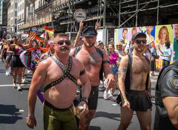 stock image London / UK - Jun 29 2024: Gay Leatherman walk at the annual Pride in London parade. The celebration brings together people from LGBTQ+ communities.