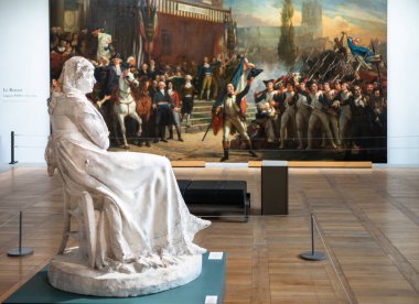 Vital Cornu tarafından Madam Roland olarak bilinen Jeanne-Marie Phlipon 'un 1899 yılındaki gerçek çalışma modeli Fransız Devrimi Müzesi, Vizille, Isere, Fransa' daki devrimci bir tablonun önünde sergilenmektedir..