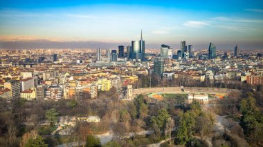 Aerial view of Milan looking northeast from Branca Tower past Atletica Meneghina and towards Porta Nuova, Lombardy, Italy clipart