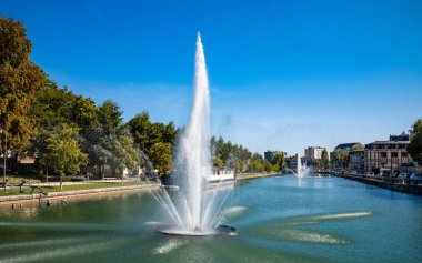 Fountains in the River Seine next to the Quai la Fontaine in Troyes, Aube, France clipart