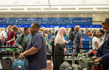 Gatwick Airport, London, UK, 7 Jul 2023. People queue to check in for flights at Gatwick Airport. Thousands of flights in Europe could be delayed or cancelled this summer as air traffic controllers  threaten to strike. clipart