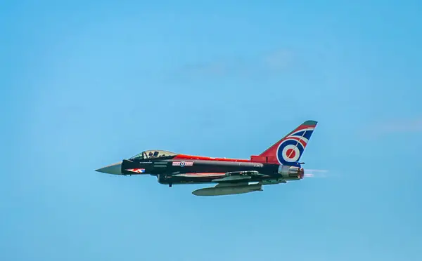 stock image RAF Eurofighter Typhoon FGR4 flies along the seafront at  the annual Eastbourne Airbourne, an international airshow